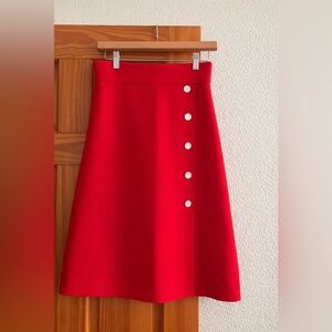 Ann Taylor Vibrant Red A-Line Skirt with Peral Buttons
Size 00P